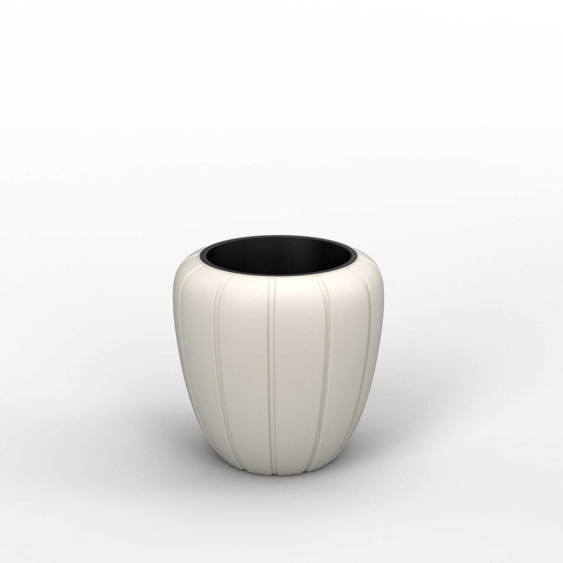 Elegancka i nowoczesna doniczka w kremowym kolorze na rośliny i kwiaty