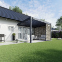 Pergola Deluxe Wall 3.6x4 antracytowa na tarasie w ogrodzie, widziana z dystansu.